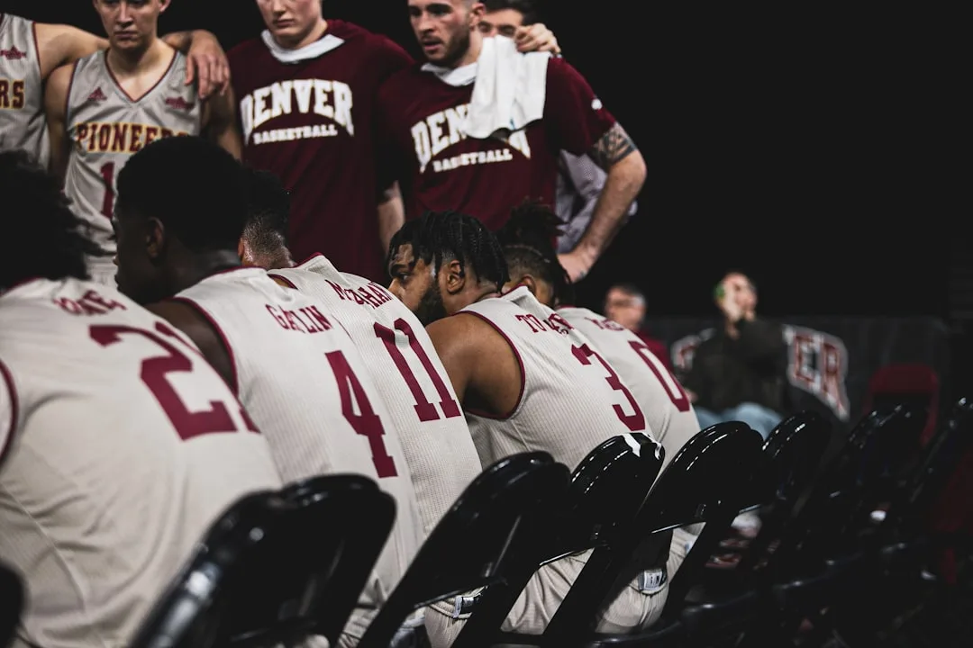 Generic college athletes outside a courthouse in a case involving NCAA eligibility rules.