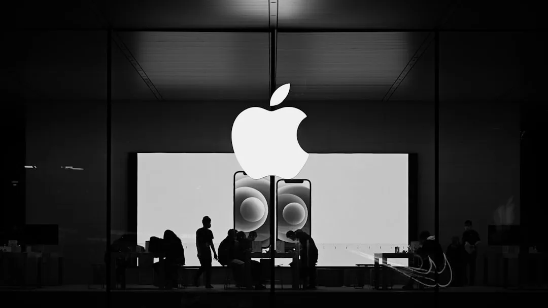 An iPhone screen showing Apple’s iOS 27 public beta and upgraded Siri interface.