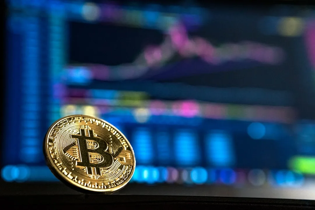 A digital Bitcoin symbol declining against a backdrop of an oil refinery and financial data.