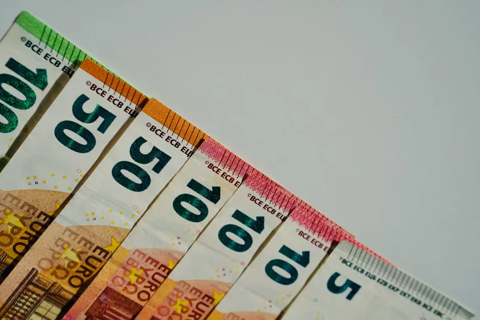 Concept illustration of the ECB digital euro pilot with smartphone payments and euro symbols
