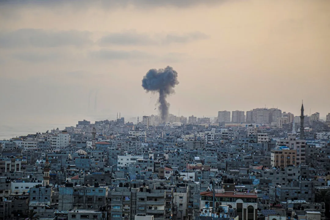 Smoke rising over the Gaza Strip skyline following military operations.