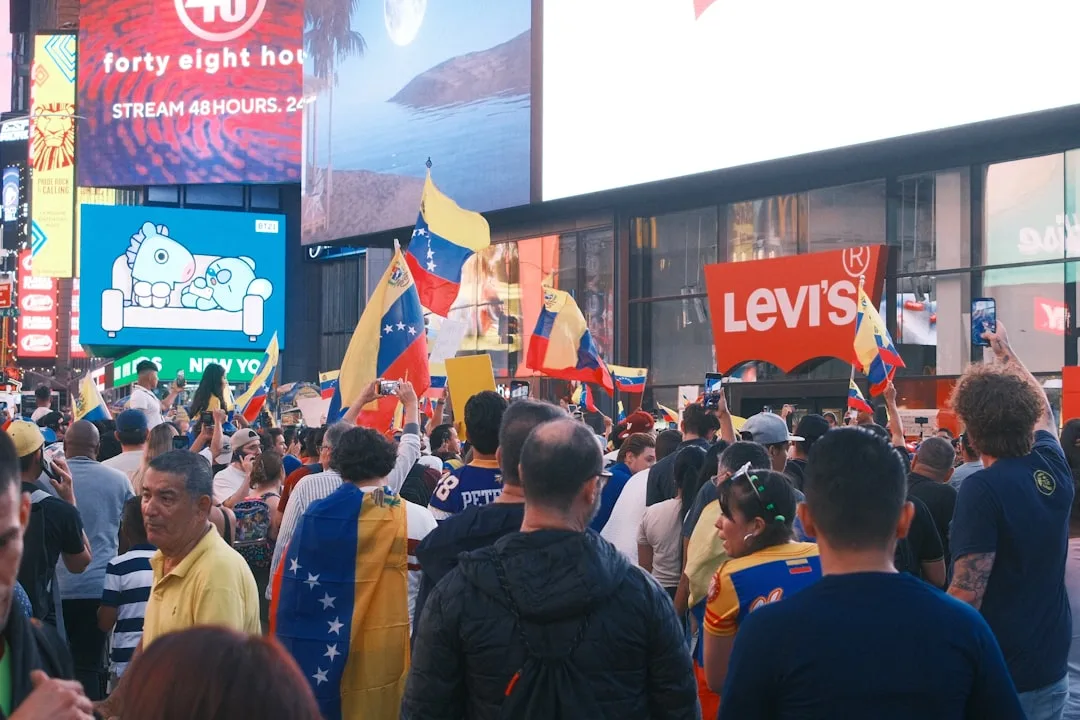 Aid workers and damaged buildings in Venezuela after earthquakes amid debate over U.S. sanctions relief.