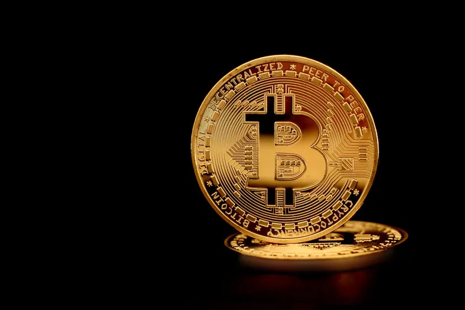 Michael Saylor, CEO of MicroStrategy, in front of a bitcoin logo