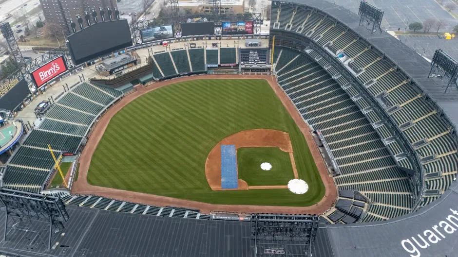 A baseball draft podium set for the first overall pick with Chicago White Sox imagery nearby.