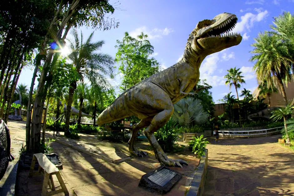 Illustration of a long-necked sauropod dinosaur in a Jurassic landscape in Thailand.