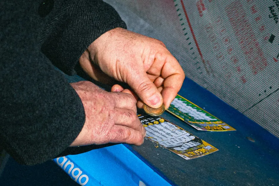 Scratch-off lottery tickets at an Ohio store counter during a story about a $30,000 win