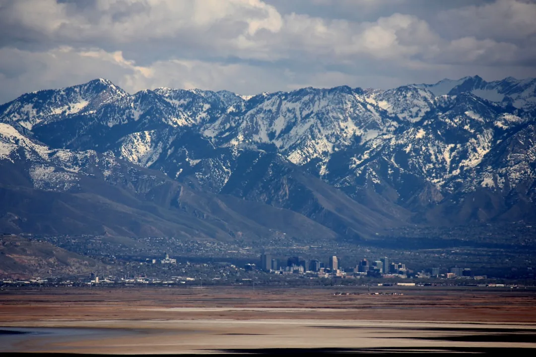 Salt Lake City skyline during a record-breaking heatwave with hazy skies.