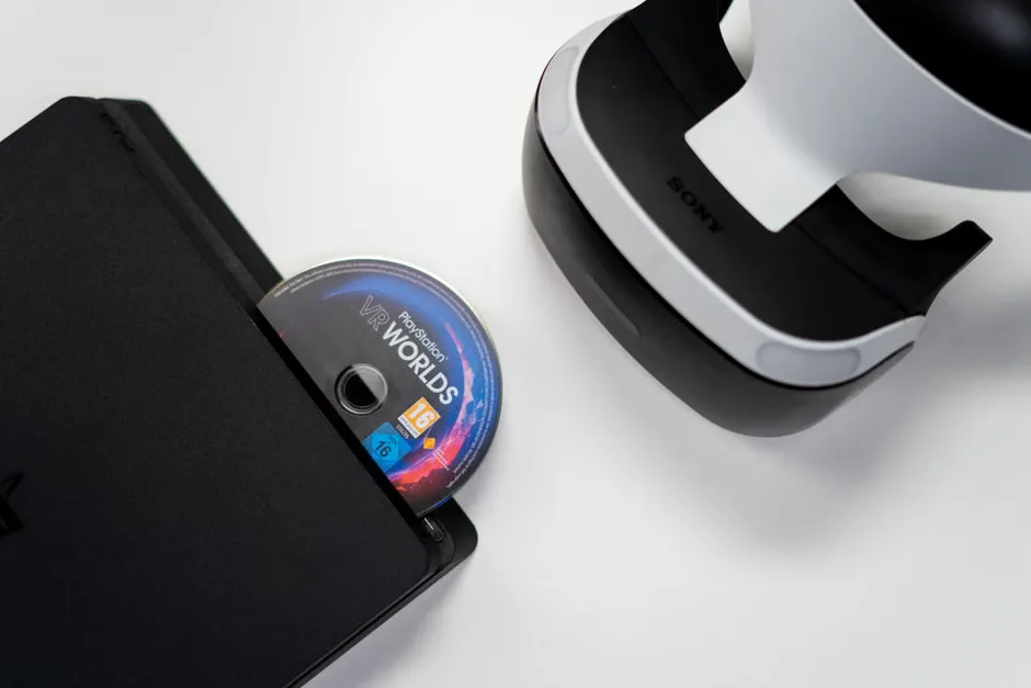 PlayStation game disc and console beside legal paperwork with a Mexico map in the background.