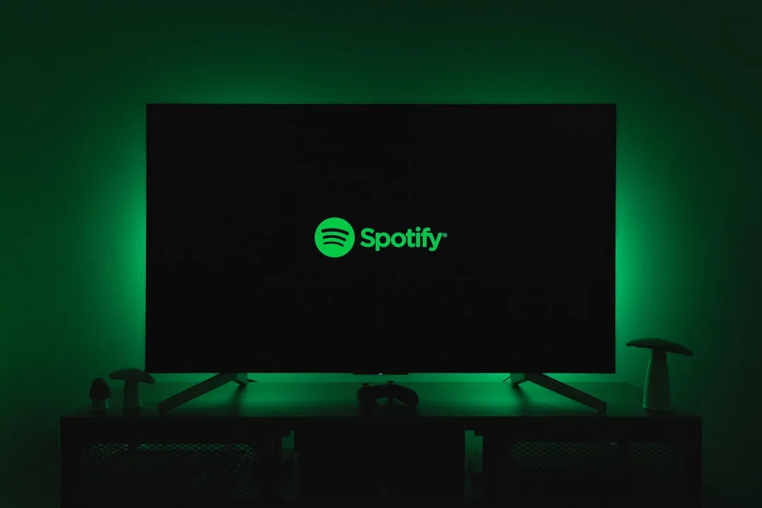 Parent and child using Spotify on a tablet