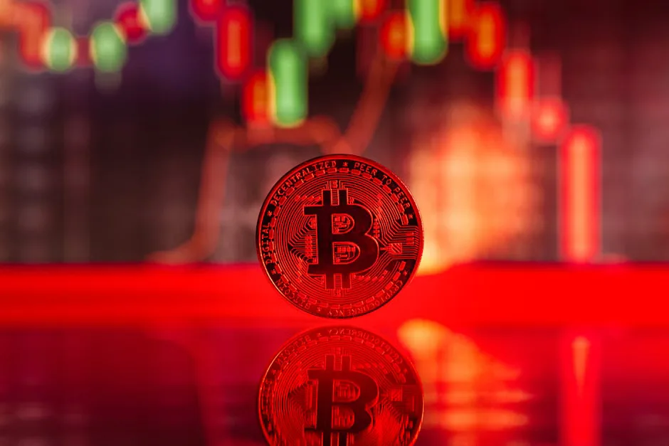 Bitcoin symbol and stock chart representing Strategy Inc. and MSTR stock risk.