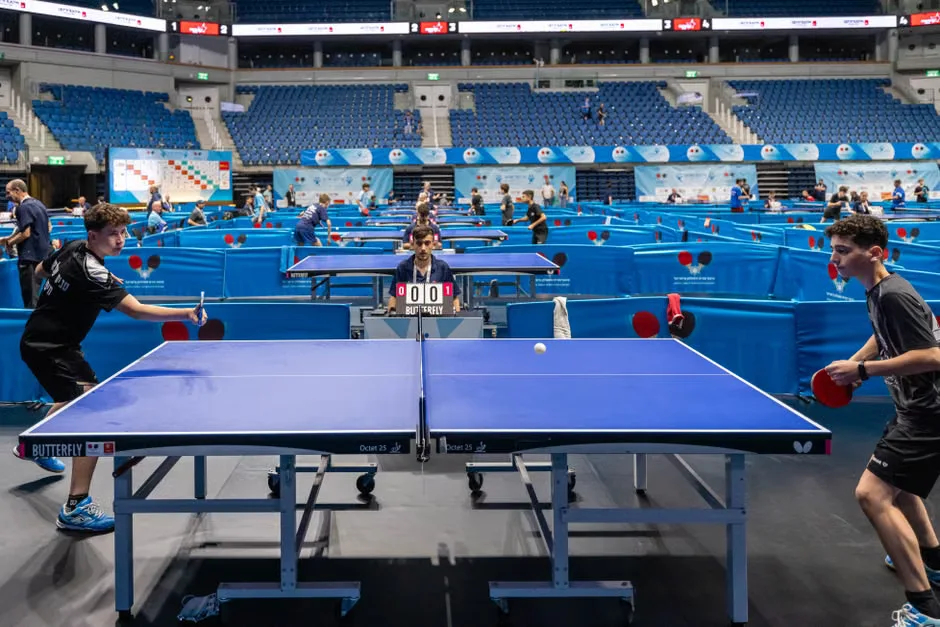 A professional gaming stage at Summer Games Done Quick with a donation counter showing $2.4 million.