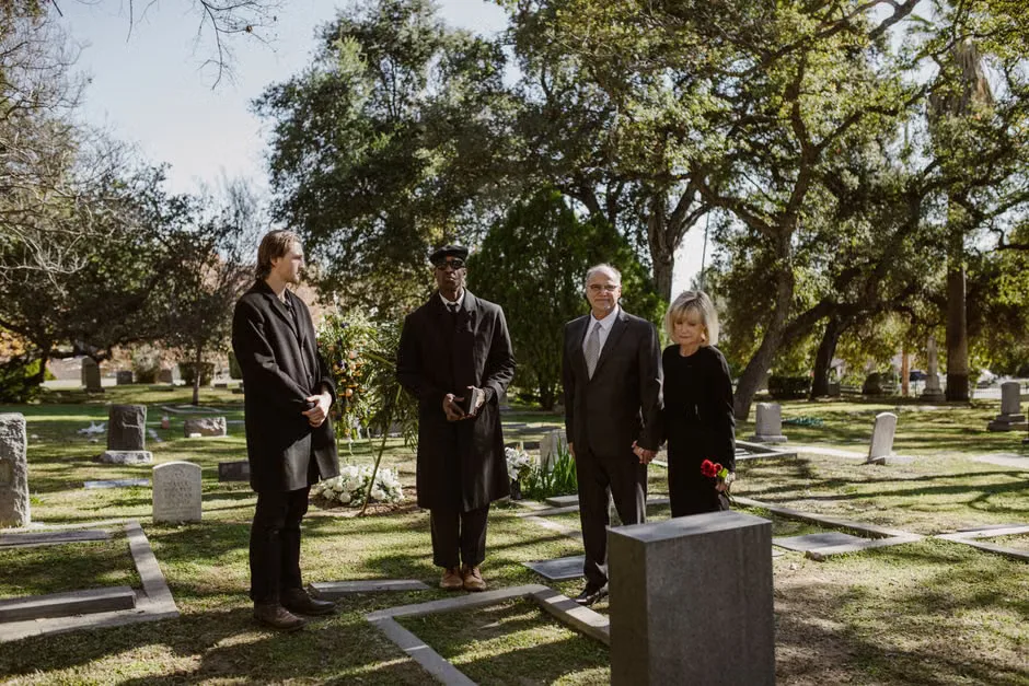 Sam Neill at a film event in a respectful memorial-style image
