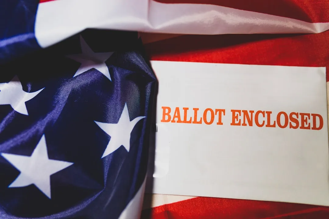 A ballot box and American flag with the White House in the background.