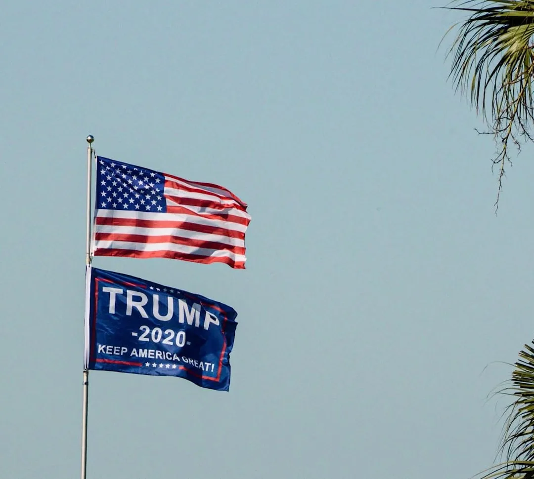 Podium prepared for a prime-time political speech with U.S. flags in the background