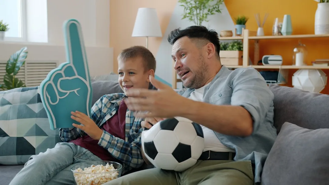 Smartphone showing a TV-tracking app interface with watchlists and fan discussion features
