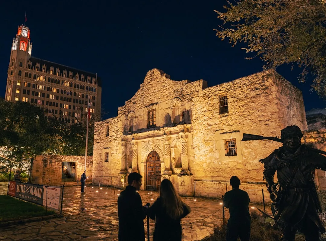 The University of Texas at San Antonio campus buildings under a severe storm sky.