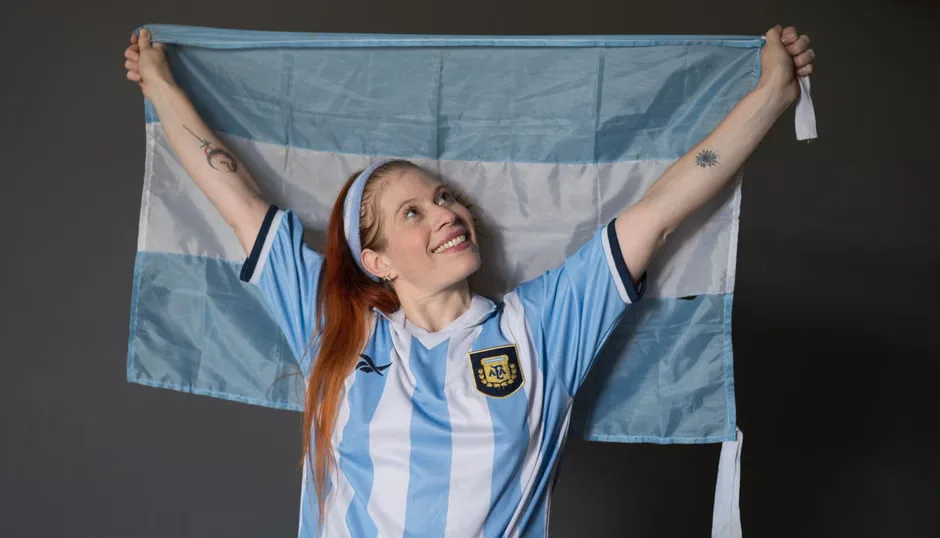 Crowd waving Argentina and England flags at a World Cup semifinal match